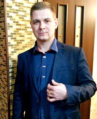 Андрей Цюра